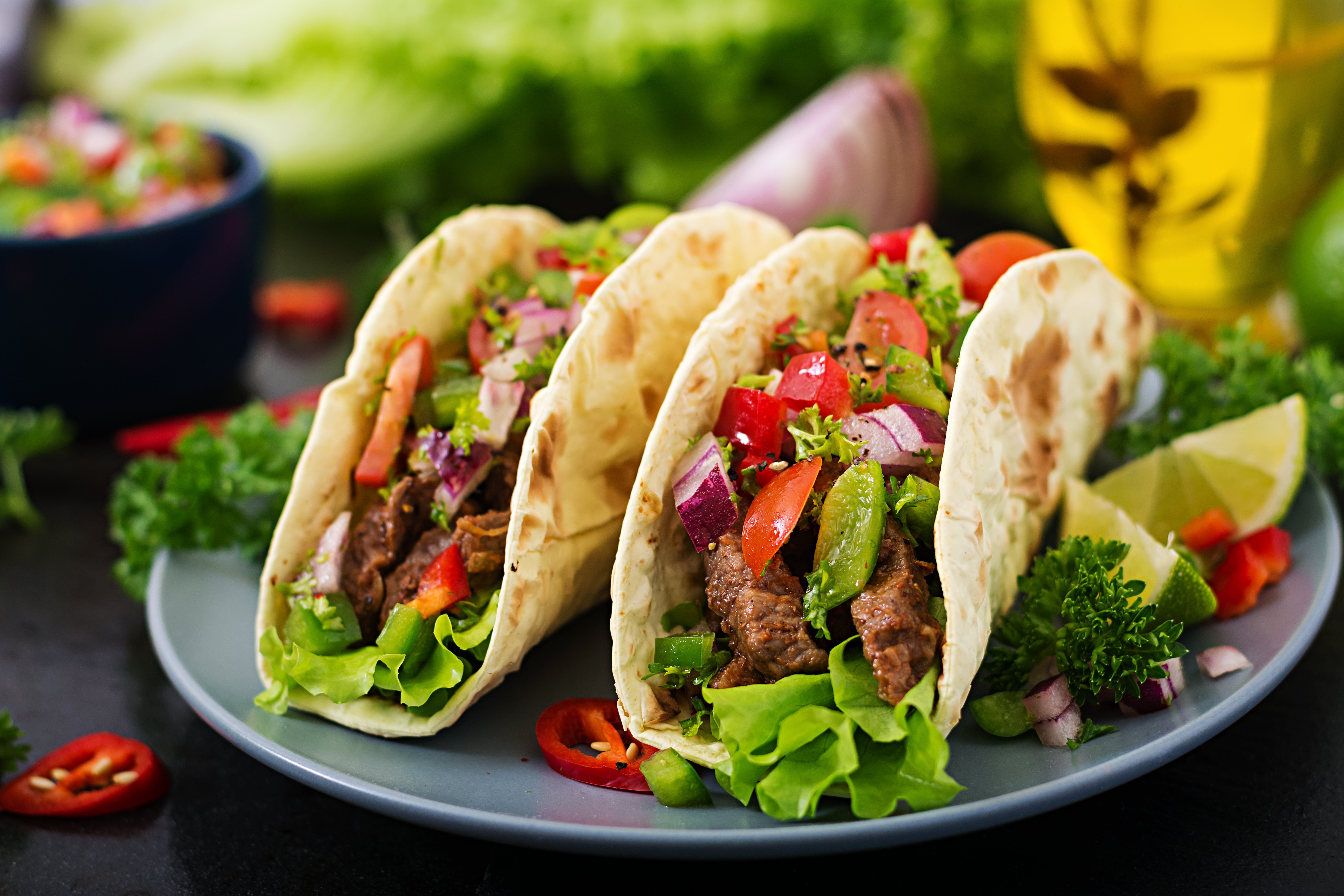 mexican-tacos-with-beef-in-tomato-sauce-and-salsa-jpg